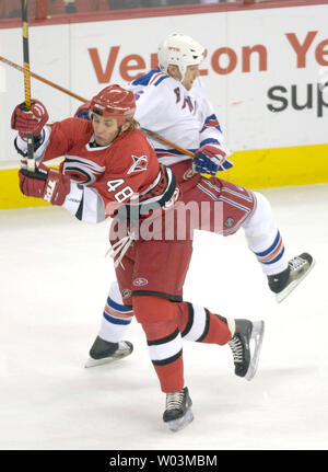 New York Rangers (6) Darius Kasparaitis chases Toronto Maple Leafs (28) Tie  Domi for the puck in the first period at Madison Square Garden in New York  City on March 18, 2006. (UPI Photo/John Angelillo Stock Photo - Alamy