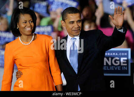 Democratic presidential candidate Sen. Barack Obama (D-IL) and his wife Michelle take the stage at an election night rally at the North Carolina State University in Raleigh on May 6, 2008. Both North Carolina and Indiana held primaries today. (UPI Photo/Kevin Dietsch) Stock Photo