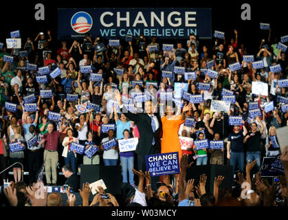 Democratic presidential candidate Sen. Barack Obama (D-IL) and his wife Michelle wave to the crowd after Obama delivered election night remarks after winning the North Carolina Primary at a rally at the North Carolina State University in Raleigh on May 6, 2008. Both North Carolina and Indiana held primaries today. (UPI Photo/Kevin Dietsch) Stock Photo