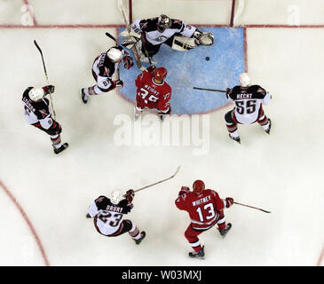 https://l450v.alamy.com/450v/w03mxj/buffalo-sabres-goaltender-ryan-miller-30-reaches-for-the-puck-in-front-of-teammates-brian-campbell-51-jochen-hecht-55-and-carolina-hurricanes-doug-weight-39-during-game-7-of-the-nhl-eastern-conference-finals-at-the-rbc-center-in-raleigh-nc-june-1-2006-carolina-won-4-2-to-advance-to-the-stanley-cup-finals-and-will-face-the-edmonton-oilers-watching-the-play-are-buffalo-sabres-chris-drury-23-and-carolina-hurricanes-ray-whitney-13-upi-photojeffrey-a-camarati-w03mxj.jpg