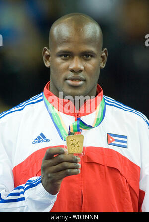 Cuba's Oreidis Despaigne shows off his gold medal won against Canada's Keith Morgan in the men's judo 100 kg half-heavy gold medal match at the 2007 Pan Am Games in Rio de Janeiro, Brazil on July 20, 2007.  (UPI Photo/Heinz Ruckemann) Stock Photo