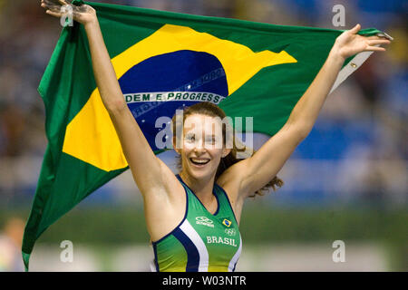Brazil's Fabiana Murer celebrates a new Pan Am Games record, winning gold with a jump of 4.60m in women's pole vault final during the 2007 Pan Am Games in Rio de Janeiro, Brazil on July 23, 2007.  (UPI Photo/Heinz Ruckemann) Stock Photo