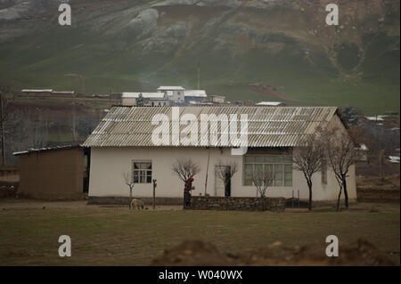 Rural life in Southern Uzbekistan, near the Boysun Plateau, can be cold and difficult during cold winter months. Stock Photo