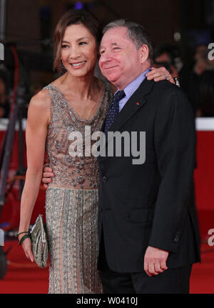 Michelle Yeoh and husband Jean Todt arrive on the red carpet before a screening of the film 'The Lady' during the opening of the 6th Rome International Film Festival in Rome on October 27, 2011.   UPI/David Silpa Stock Photo