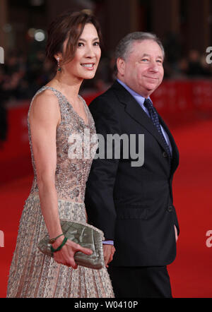 Michelle Yeoh and husband Jean Todt arrive on the red carpet before a screening of the film 'The Lady' during the opening of the 6th Rome International Film Festival in Rome on October 27, 2011.   UPI/David Silpa Stock Photo