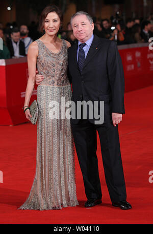 Michelle Yeoh and husband Jean Todt arrive on the red carpet before a screening of the film 'The Lady' during the opening of the 6th Rome International Film Festival in Rome on October 27, 2011.   UPI/David Silpa Stock Photo