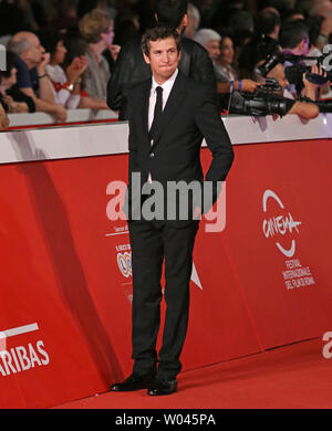 Guillaume Canet arrives on the red carpet before the screening of the film 'La prochaine fois je viserai le coeur (Next Time I'll Aim for the Heart' at the 9th annual Rome International Film Festival in Rome on October 20, 2014.   UPI/David Silpa Stock Photo