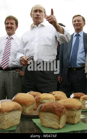 Russian President Vladimir Putin accompanied by First Deputy Prime Minister Sergei Ivanov (R) visits an agricultural exhibition in the southern city of Rostov-on-Don on June 30, 2007. (UPI Photo/Anatoli Zhdanov) Stock Photo