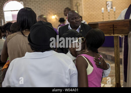 Sunday morning service at St. Michaels and All Angles church in Alexandra Township outside of Johannesburg, South Africa, December 8, 2013. Nelson Mandela's first house in Johannesburg was one block from this church in 1941 when he was 23 years old. Mandela, former South African president and an icon of the anti-apartheid movement, died on December 5, at age 95 after complications from a recurring lung infection. UPI/Charlie Shoemaker Stock Photo