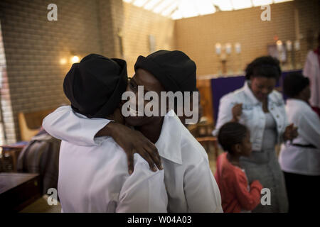 Sunday morning service at St. Michaels and All Angles church in Alexandra Township outside of Johannesburg, South Africa, December 8, 2013. Nelson Mandela's first house in Johannesburg was one block from this church in 1941 when he was 23 years old. Mandela, former South African president and an icon of the anti-apartheid movement, died on December 5, at age 95 after complications from a recurring lung infection. UPI/Charlie Shoemaker Stock Photo