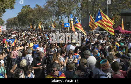 People gather to celebrate the proclamation of a Catalan republic at the Sant Jaume Square in Barcelona in Spain, on October 27, 2017. Catalonia's regional parliament voted to declare independence from Spain today just as the Spanish Parliament voted to impose direct rule on the region from Madrid.   Photo by Xavi Herrero/ UPI Stock Photo