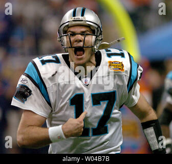 Carolina Panthers quarterback Jake Delhomme celebrates a Carolina Panthers quarterback Jake Delhomme celebrates a