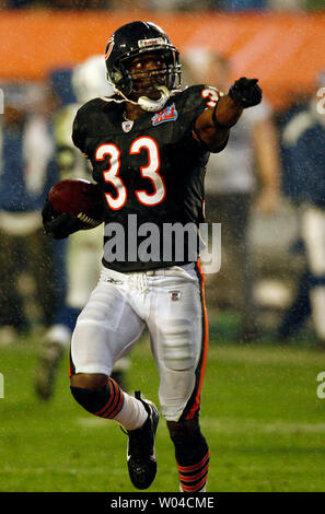 Chicago Bears cornerback Charles Tillman celebrates after returning an  interception for a touchdown duri…