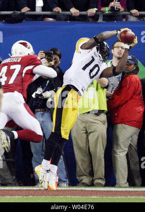 Super Bowl MVP Pittsburgh Steelers Santonio Holmes holds the Vince Lombardy  Trophy after his team defeated the Arizona Cardinals 27-23 at Super Bowl  XLIII at Raymond James Stadium in Tampa, Florida, on