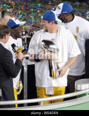 Super Bowl MVP Pittsburgh Steelers Santonio Holmes holds the Vince Lombardy  Trophy after his team defeated the Arizona Cardinals 27-23 at Super Bowl  XLIII at Raymond James Stadium in Tampa, Florida, on