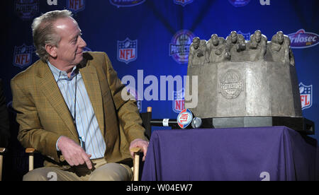 Archie Manning, father of Indianapolis Colts quarterback Peyton Manning and former New Orleans Saints quarterback himself, looks over the trophy during a news conference naming the New Orleans Saints offensive line as the first Madden Most Valuable Protectors at the Media Center in Ft. Lauderdale on February 3, 2010. Super Bowl XLIV will feature the Indianapolis Colts and New Orleans Saints on Sunday, February 7.    UPI/Roger L. Wollenberg Stock Photo