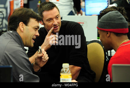 Actor Hugh Jackman (C) and Sugar Ray Leonard (R) are interviewed on Radio Row at the Super Bowl XLV Media Center in Dallas, Texas, on February 4, 2011. Jackman studied boxing with Sugar Ray Leonard for Jackman's upcoming movie 'Real Steel.'   UPI/Rob Hobson Stock Photo