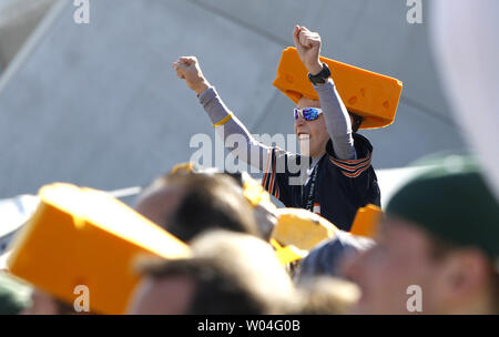 Green Bay, United States. 16th Jan, 2021. Green Bay Packers fan wearing a  Cheese Head cheers on his team as they defeat the Los Angeles Rams 32-18  during the Divisional Playoff at