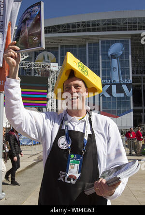 Jack Means III, a Green Bay Packers fan and program salesman from  Pennsylvannia, wears a cheesehead hat during Super Bowl XLV at Cowboys  Stadium in Arlington, Texas on February 6, 2011. UPI/Gary