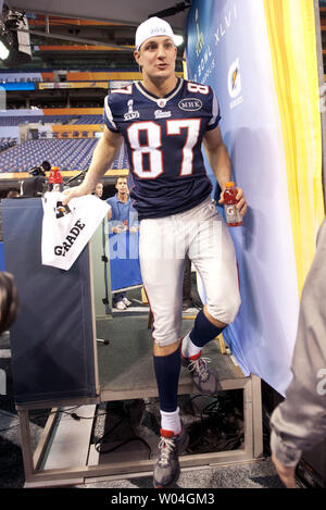 New England Patriots tight end Ron Gronkowski arrives on the field for  media day prior to Super Bowl XLVI in Indianapolis on January 31, 2012.  This is Gronkowski's first day without wearing