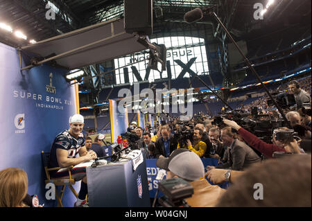 New England Patriots tight end Ron Gronkowski arrives on the field for  media day prior to Super Bowl XLVI in Indianapolis on January 31, 2012.  This is Gronkowski's first day without wearing