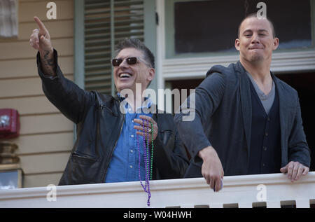 Craig Ferguson (L), host of the Late Late Show, makes an appearance on a second floor balcony to celebrate in the French Quarter on Bourbon Street for Super Bowl XLVII on February 2, 2013 in New Orleans.   UPI/Gary C. Caskey Stock Photo