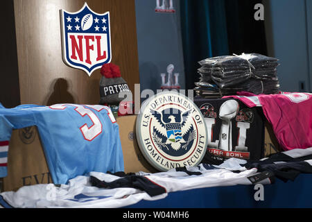 A man wears a counterfeit 10XL Cowboys jersey at a press conference on NFL  counterfeit merchandise and tickets, in Houston, Texas on February 2, 2017.  Officials with the NFL, Department of Homeland