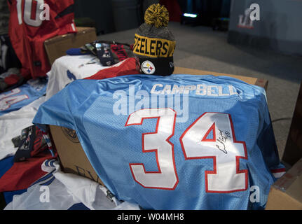 A man wears a counterfeit 10XL Cowboys jersey at a press conference on NFL  counterfeit merchandise and tickets, in Houston, Texas on February 2, 2017.  Officials with the NFL, Department of Homeland