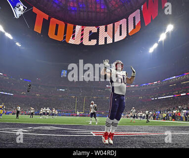 New England Patriots center David Andrews (60) celebrates teammate Sony Michel's 2-yard touchdown run against the Los Angeles Rams during the fourth quarter of Super Bowl LIII at Mercedes-Benz Stadium in Atlanta on February 3, 2019.  Photo by Kevin Dietsch/UPI Stock Photo