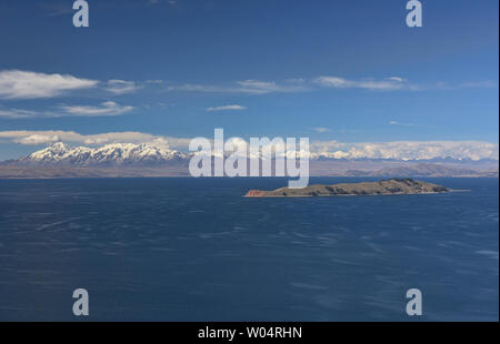 View of the entire Cordillera Real and Isla de la Luna across Lake Titicaca, Isla del Sol, Bolivia Stock Photo