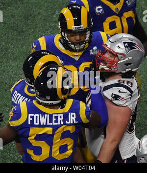 New England Patriots center David Andrews (60) confronts Los Angeles Rams linebacker Dante Fowler (56) during the first half of Super Bowl LIII at Mercedes-Benz Stadium in Atlanta on February 3, 2019.   Photo by Jon SooHoo/UPI Stock Photo