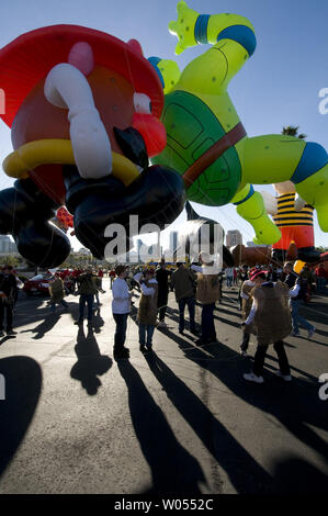 Giant balloons wait in a staging area before the start of the annual 'Port of San Diego Big Bay Balloon Parade,' held in San Diego on December 30, 2010. The parade, recognized as America's largest balloon parade, is held in conjunction with Holiday Bowl festivities. (UPI Photo/Earl S. Cryer) Stock Photo