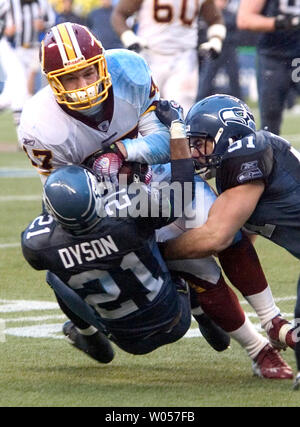 Carolina Panthers wide receiver Steve Smith hurdles Tennessee Titans  defensive back Andre Dyson at Ericsson Stadium in Charlotte, NC on October  19, 2003. (UPI/Bob Carey Stock Photo - Alamy