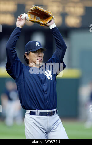 New York Yankees outfielder Hideki Matsui warms before their game against the Seattle Mariners in Seattle on August 24, 2006. Matsui broke his left wrist May 11 and has been on the disabled list. (UPI Photo/Jim Bryant) Stock Photo