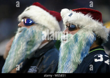 Seattle Seahawk fan, Robert Nelson, left, and Randy Willis watch the San Diego Chargers beat the Seahawks 20-17 December 24, 2006 in Seattle. (UPI Photo/Jim Bryant) Stock Photo