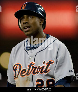 Detroit Tigers' Curtis Granderson walks off the field after the