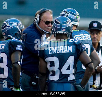 Seattle Seahawks wide receivers Deion Branch (L) and T.J. Houshmandzadeh  walk off the field following their