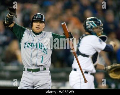 Tampa Bay Devil Rays' Akinori Iwamura adjusts his batting gear after being  walked by Seattle Mariners' Ryan Feierabend in the fifth inning of their  baseball game Saturday, Sept., 15, 2007, in Seattle. (