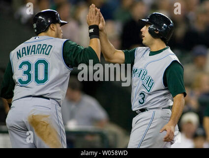 Tampa Bay Devil Rays' Dioner Navarro watches his fifth inning solo home ...