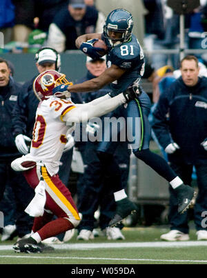 Oct. 10, 2010 - Landover, Maryland, United States of America - Washington  Redskins safety LaRon Landry (30) pass interception and run stopped by  Green Bay Packers wide receiver Donald Driver (80), week