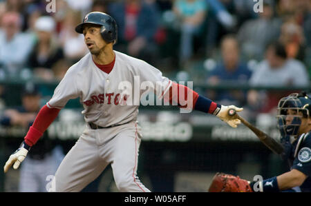 Boston Red Sox' Julio Lugo watches his grounder against the Seattle Mariners in the third inning at Safeco Field in Seattle May 26, 2008. Lugo was thrown out by Mariner's third baseman Adrian Beltre. The Red Sox beat the Mariners 5-3. (UPI Photo/Jim Bryant) Stock Photo