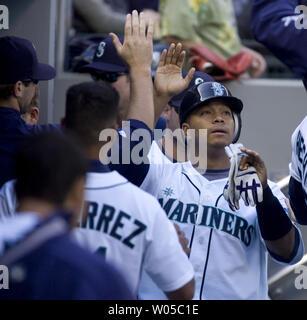 Seattle Mariners, from left, Dan Wilson, Ichiro Suzuki, Raul