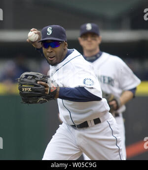 Seattle Mariners' second baseman Chone Figgins gets set to throw to first base after fielding a ground ball hit by  San Diego Padres'  Tony Gwynn in the  second inning at SAFECO Field in Seattle May 23, 2010.  The Padres beat the Mariners 8-1.   UPI/Jim Bryant Stock Photo