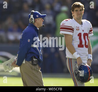 New York Giants' head coach Tom Coughlin talks to quarterback Eli Manning in their game against the Seattle Seahawks in the first quarter on Sunday  November 7, 2010 at Qwest Field in Seattle.      (UPI Photo/Jim Bryant) Stock Photo