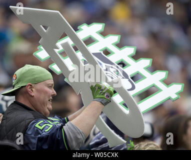 Seattle Seahawks fan Lorin 'Big Lo' Sandretzky cheers on the Seattle defensive unit during the second quarter against the Baltimore Ravens at  CenturyLink Field in Seattle, Washington on November 13, 2011. The Seahawks beat the Ravens 22-17. UPI/Jim Bryant Stock Photo