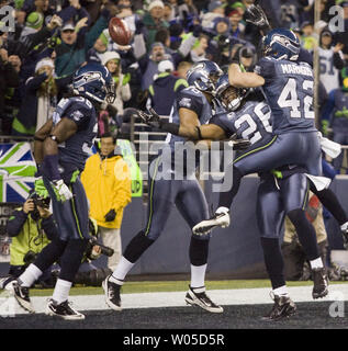 Chris Maragos of the Seattle Seahawks in action against the Denver