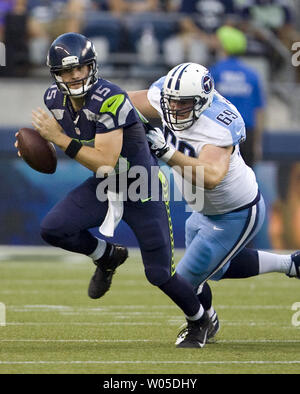 Seattle Seahawks quarterback Matt Flynn (15) looks to pass during NFL  football training camp, Wednesday, Aug. 8, 2012, in Renton, Wash. (AP  Photo/Ted S. Warren Stock Photo - Alamy