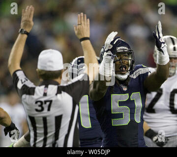 Seattle Seahawks linebacker Bruce Irvin (51) sacks Carolina Panthers  quarterback Cam Newton (1) at CenturyLink Field in Seattle on October 18,  2015. The Panthers came from behind with 32 seconds remaining in