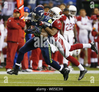 Seattle Seahawks running back, Robert Turbin (22) shows off his NFC Champion  t-shirt following the Seahawaks win over the San Francisco 49ers during the NFC  Championship Game at Centurylink Field in Seattle