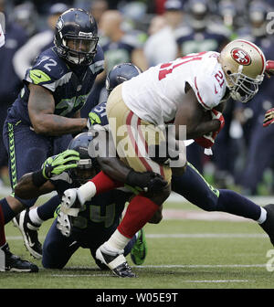 Kam Chancellor (31) of the Seattle Seahawks defends Owen Daniels (81) of  the Houston Texans on a pass that was deflected an intercepted in the first  half of their game on Sunday